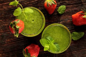 fresh green smoothie with strawberry